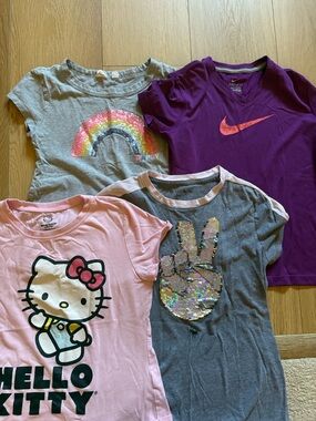 Nike Purple Girls' Short Sleeve Dri-FIT Tee with Pink Swoosh